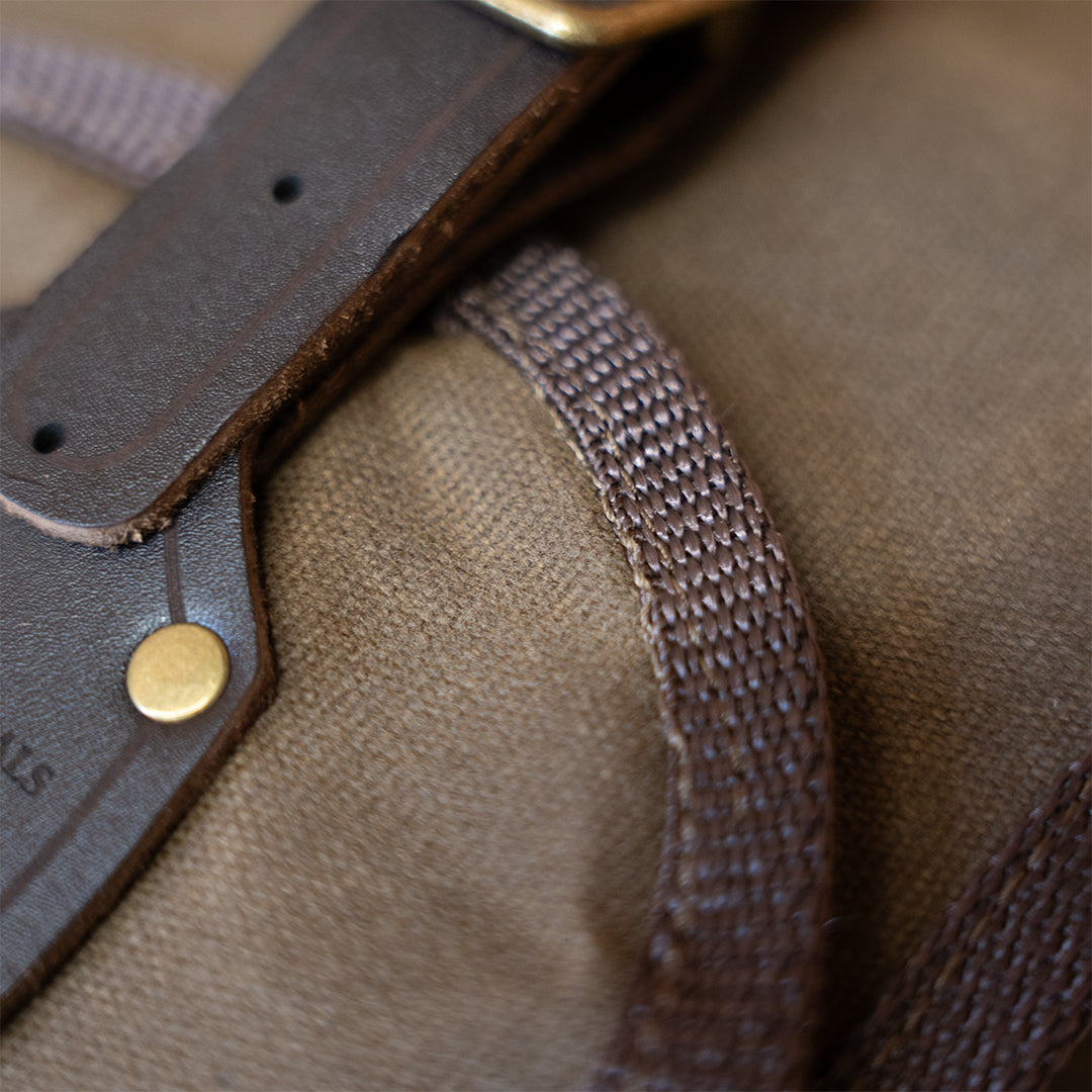 Close-up of durable stitching and leather strap on Clearance: Carrying Sling for Saws and Axes, showcasing quality craftsmanship.