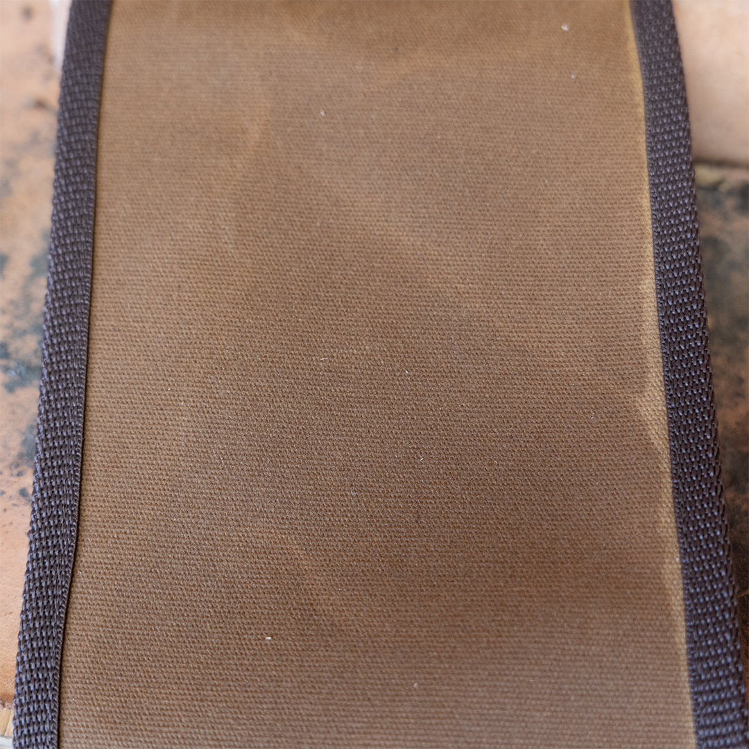 Back panel of Clearance: Carrying Sling for Saws and Axes, featuring durable canvas construction for outdoor tool protection.