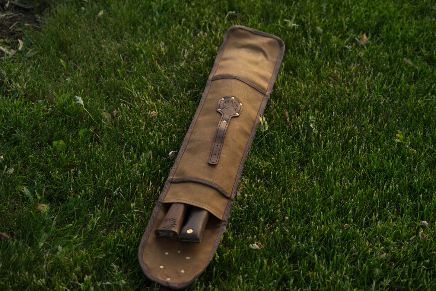 Waxed canvas carrying case for saw and axe