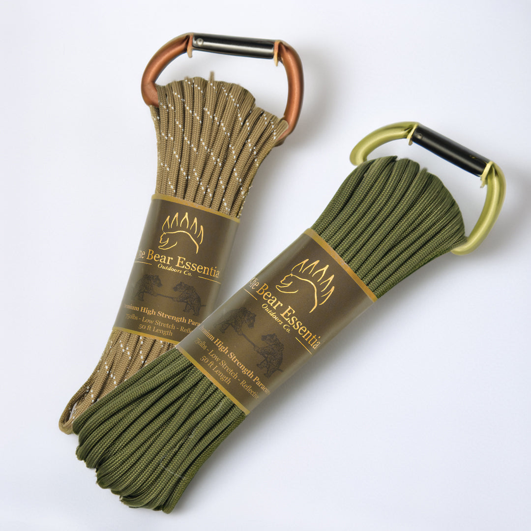 Bear Essentials Premium Bushcraft Paracord in olive and camo colors with carabiners, ideal for camping and hiking with 750lbs strength.