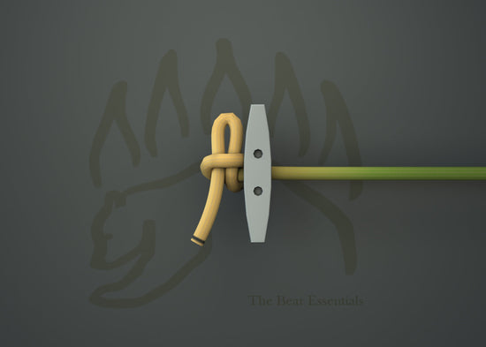 Slip knot tied around a peg with rope, demonstrating knot-tying basics.