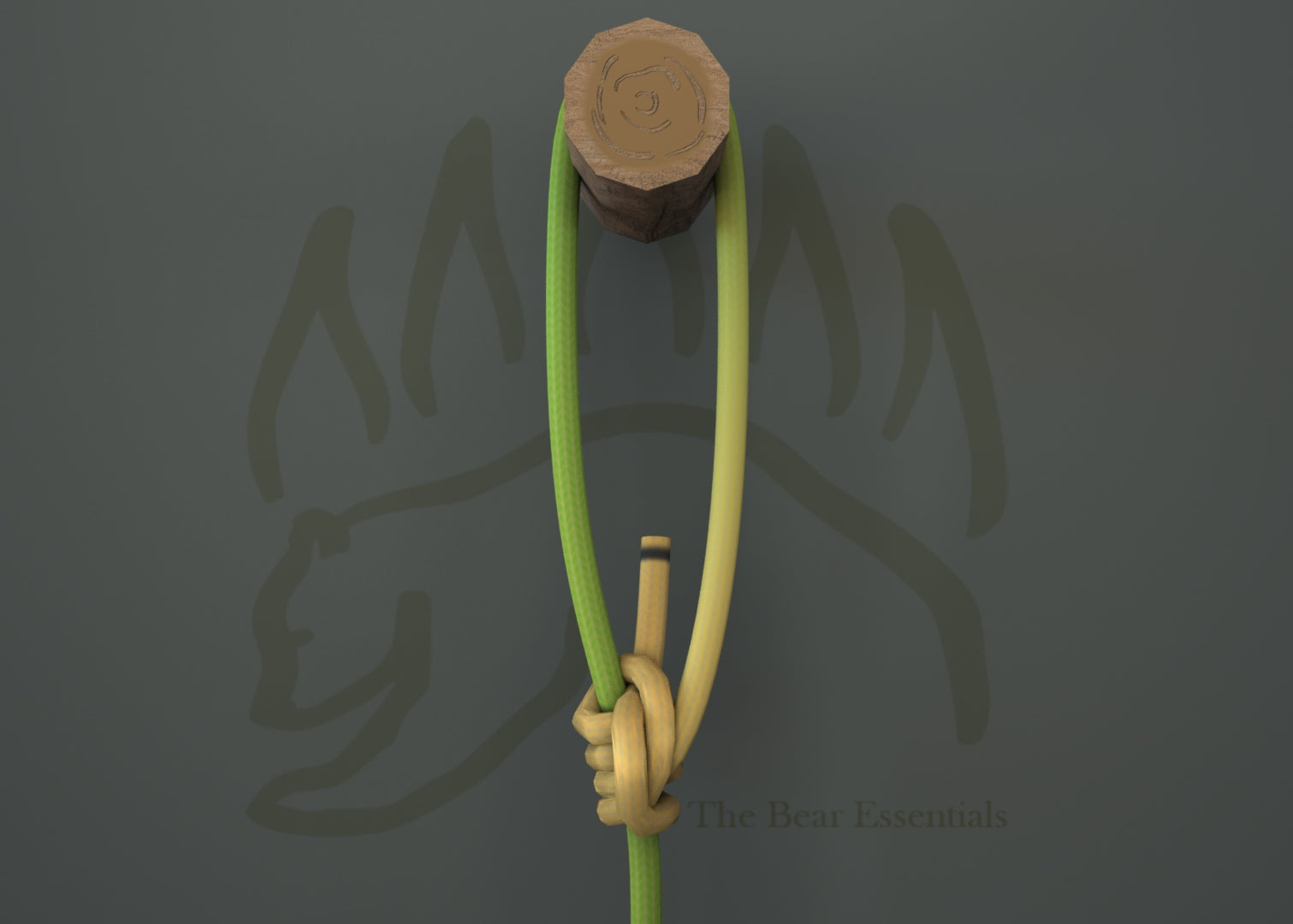 Tarbuck knot tied with green and yellow ropes on a wooden peg.