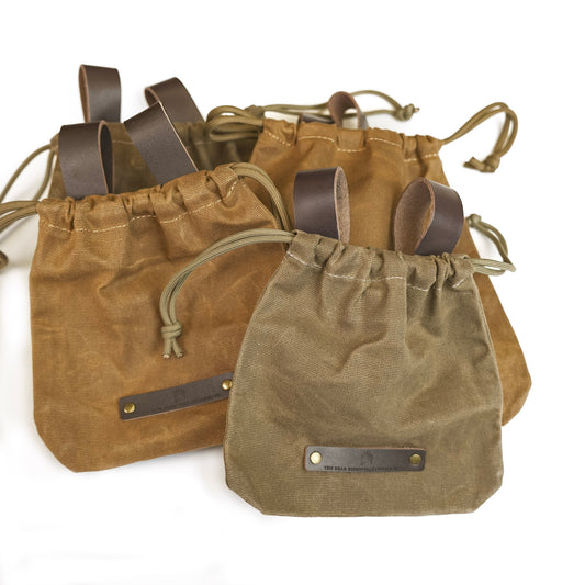 Product lay  of waxed canvas foraging bag